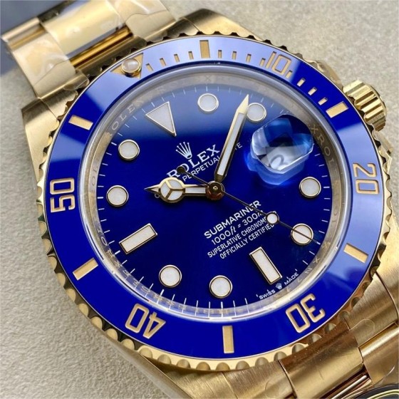 Rolex Submariner, blue dial, blue bezel, 40mm, gold Oyster bracelet.