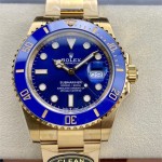 Rolex Submariner, blue dial, blue bezel, 40mm, gold Oyster bracelet.
