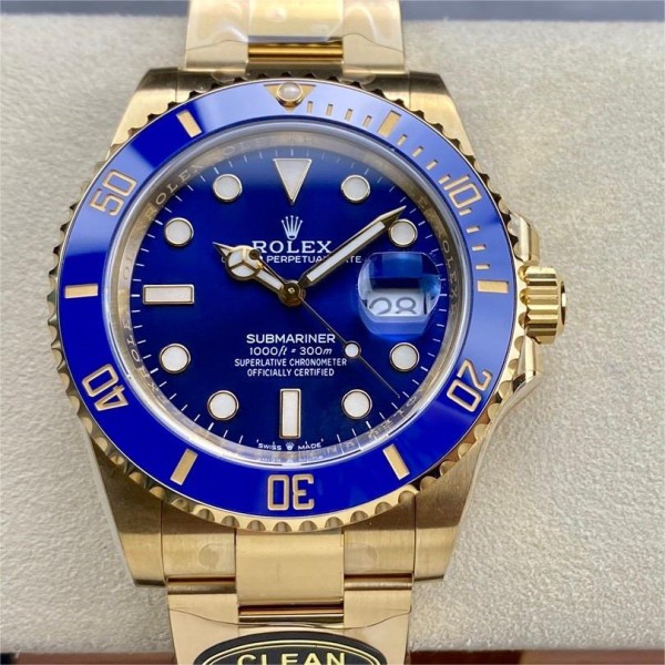 Rolex Submariner, blue dial, blue bezel, 40mm, gold Oyster bracelet.
