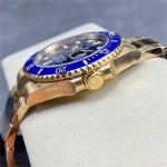 Rolex Submariner, blue dial, blue bezel, 40mm, gold Oyster bracelet.
