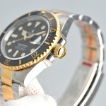 Rolex Submariner, black dial, 41mm, two-tone gold and silver bracelet.