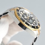 Rolex Submariner, black dial, 41mm, two-tone gold and silver bracelet.