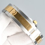 Rolex Submariner, black dial, 41mm, two-tone gold and silver bracelet.