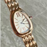 Bulgari snake watch with white dial and gold strap