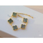 Four-leaf clover gold and grey shell bracelet