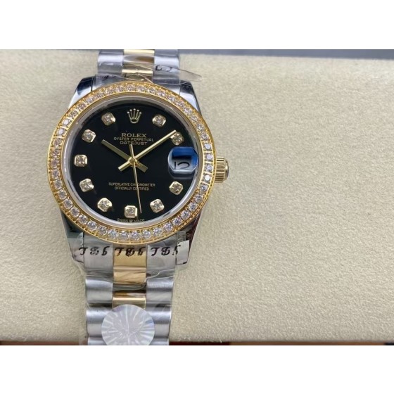 Datejust diamond black dial gold and silver strap 31mm