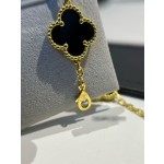 Four-leaf clover bracelet gold and black