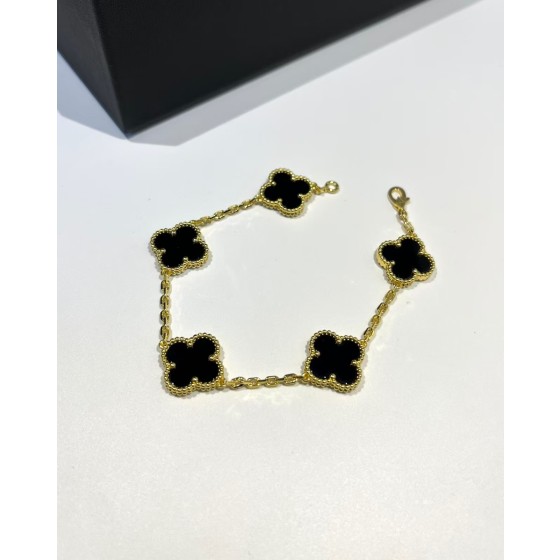 Four-leaf clover bracelet gold and black