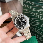Rolex Yacht-Master series, black dial, black bezel, silver case, 40mm, silver Oyster bracelet.