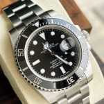 Rolex Yacht-Master series, black dial, black bezel, silver case, 40mm, silver Oyster bracelet.