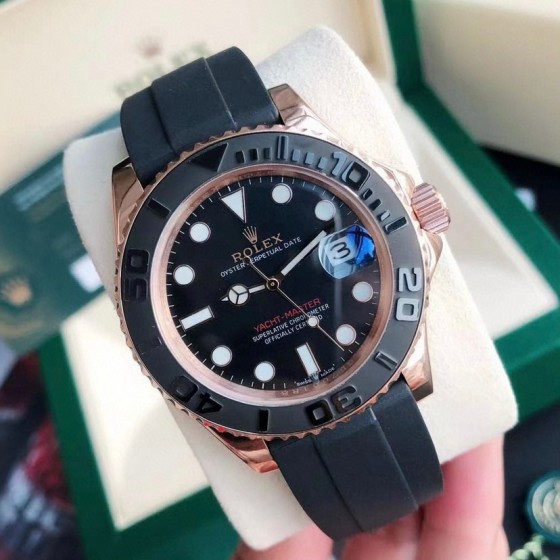 Rolex Yacht-Master series, black dial, black bezel, rose gold case, 40mm, rubber strap.