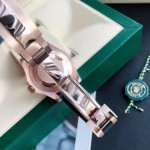 Rolex Yacht-Master series, black dial, black bezel, rose gold case, 40mm, rubber strap.