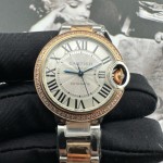 Cartier Ballon Bleu, 33mm, silver dial with diamond-set bezel, two-tone gold and silver.