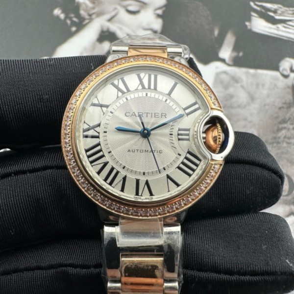 Cartier Ballon Bleu, 33mm, silver dial with diamond-set bezel, two-tone gold and silver.
