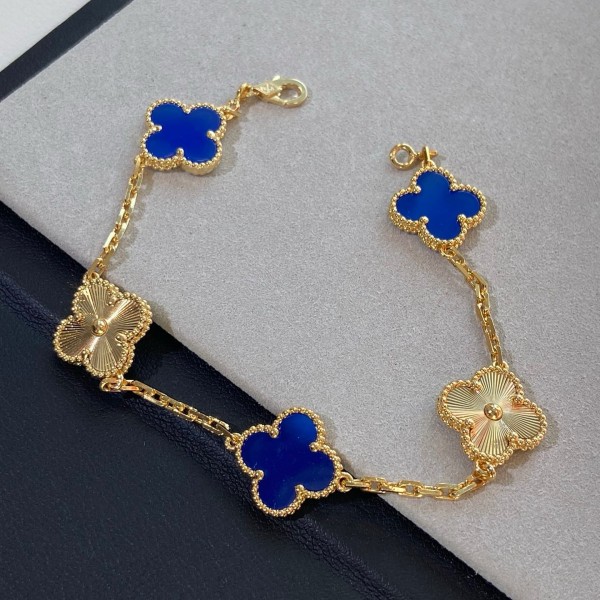 Four-leaf clover dark blue and gold laser-cut multi-strand bracelet