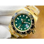 Rolex GMT-Master series, green dial, black bezel, 40mm, gold Oyster bracelet.