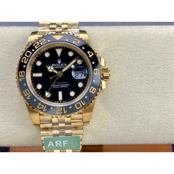 Rolex GMT-Master series, black dial, black bezel, 40mm, gold five-link bracelet.
