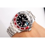 Rolex GMT-Master series, black dial, black and red bezel, 40mm, silver Oyster bracelet.