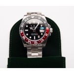 Rolex GMT-Master series, black dial, black and red bezel, 40mm, silver Oyster bracelet.