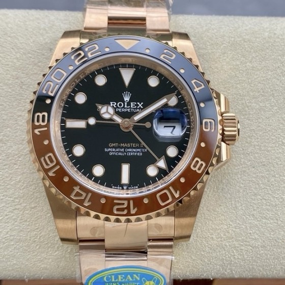 Rolex GMT-Master series, black dial, black and red bezel, 40mm, rose gold Oyster bracelet.