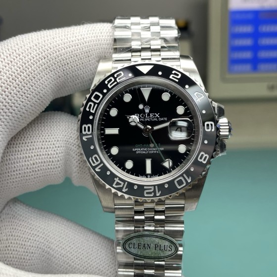 Rolex GMT-Master series, black dial, black bezel, 40mm, silver five-link bracelet.
