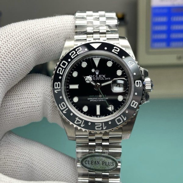 Rolex GMT-Master series, black dial, black bezel, 40mm, silver five-link bracelet.
