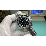 Rolex GMT-Master series, black dial, black bezel, 40mm, silver five-link bracelet.