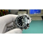 Rolex GMT-Master series, black dial, black bezel, 40mm, silver five-link bracelet.
