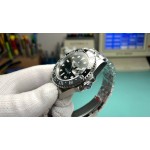 Rolex GMT-Master series, black dial, black bezel, 40mm, silver five-link bracelet.