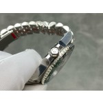 Rolex GMT-Master series, green dial, black and green bezel, 40mm, silver five-link bracelet.