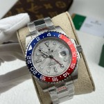 Greenwich series watch with meteorite-patterned dial, blue and red bezel, 40mm, and silver Oyster bracelet.