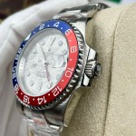 Greenwich series watch with meteorite-patterned dial, blue and red bezel, 40mm, and silver Oyster bracelet.