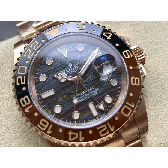 Greenwich series watch with tiger's eye dial, black and red bezel, 40mm case, and rose gold Oyster bracelet.