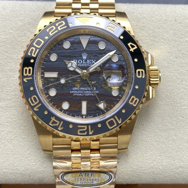 Greenwich series watch with tiger's eye dial, black bezel, and 40mm gold five-link bracelet.
