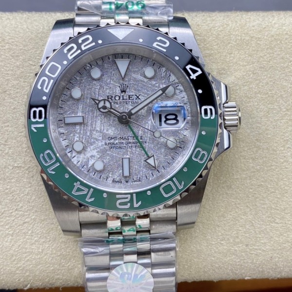 Greenwich series watch with meteorite-patterned dial, black and green bezel, 40mm case, and silver five-link bracelet.