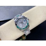 Greenwich series watch with meteorite-patterned dial, black and green bezel, 40mm case, and silver five-link bracelet.