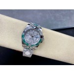 Greenwich series watch with meteorite-patterned dial, black and green bezel, 40mm case, and silver five-link bracelet.