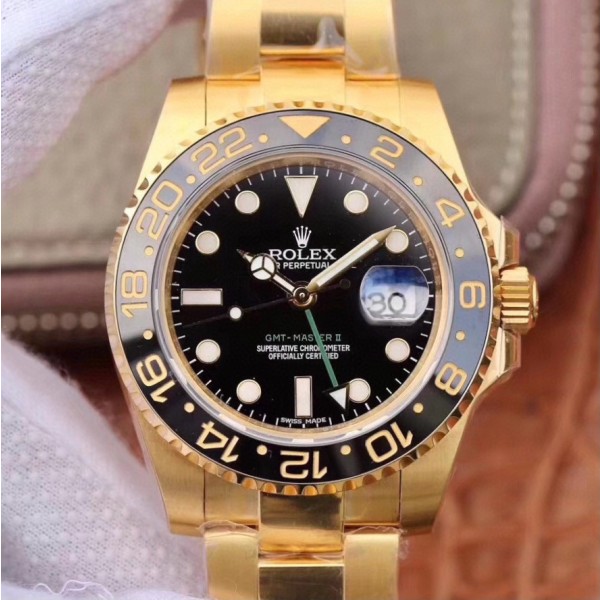 Greenwich series, black dial, black bezel, 40mm, gold Oyster bracelet.