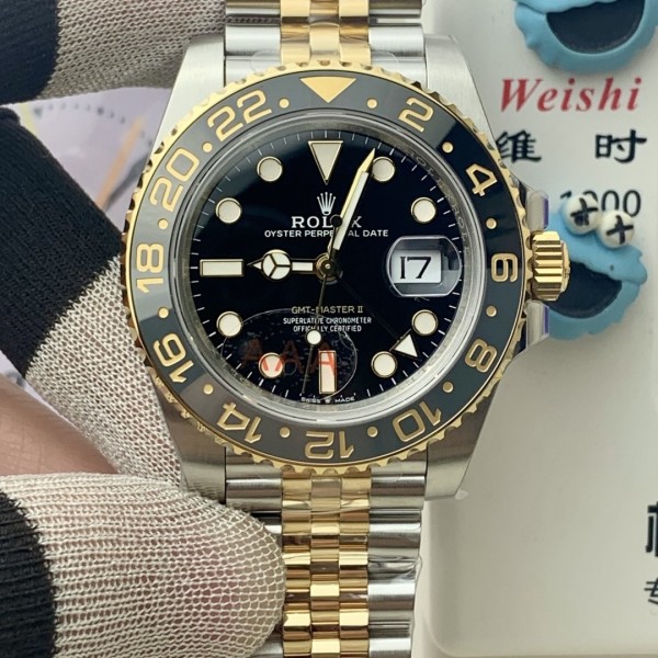 Greenwich series, black dial, black bezel, 40mm, gold and silver five-link bracelet.