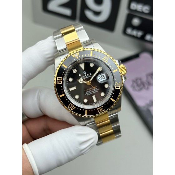 Rolex Sea-Dweller series, black dial, 43mm, silver and gold Oyster bracelet.