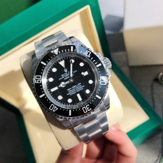 Rolex Sea-Dweller series, black dial, 44mm, silver Oyster bracelet.