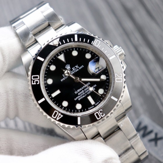 Rolex Submariner series, black dial, black bezel, 40mm, silver Oyster bracelet.
