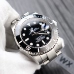 Rolex Submariner series, black dial, black bezel, 40mm, silver Oyster bracelet.