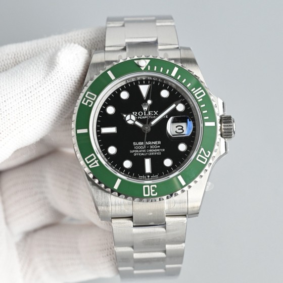 Rolex Submariner series, black dial, green bezel, 41mm, silver Oyster bracelet.