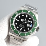 Rolex Submariner series, black dial, green bezel, 41mm, silver Oyster bracelet.