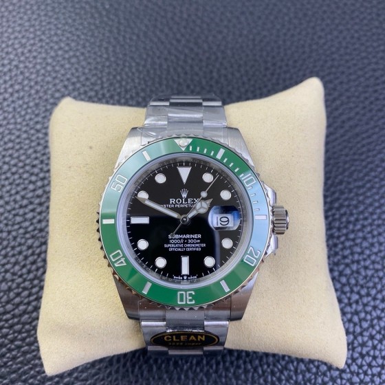 Rolex Submariner series, black dial, green bezel, 40mm, silver Oyster bracelet.