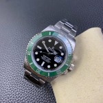 Rolex Submariner series, black dial, green bezel, 40mm, silver Oyster bracelet.