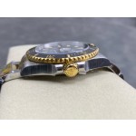 Rolex Submariner series, black dial, black bezel, 41mm, silver and gold Oyster bracelet.