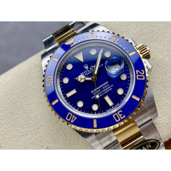 Rolex Submariner series, blue dial, blue bezel, 41mm, silver and gold Oyster bracelet.