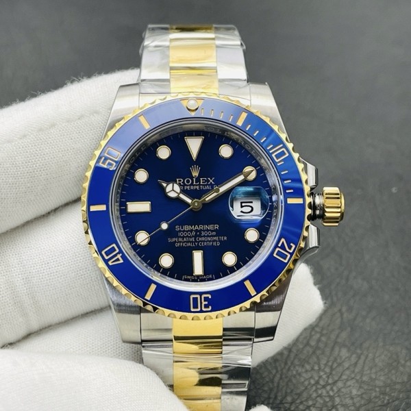 Rolex Submariner series, blue dial, blue bezel, 40mm, silver and gold Oyster bracelet.
